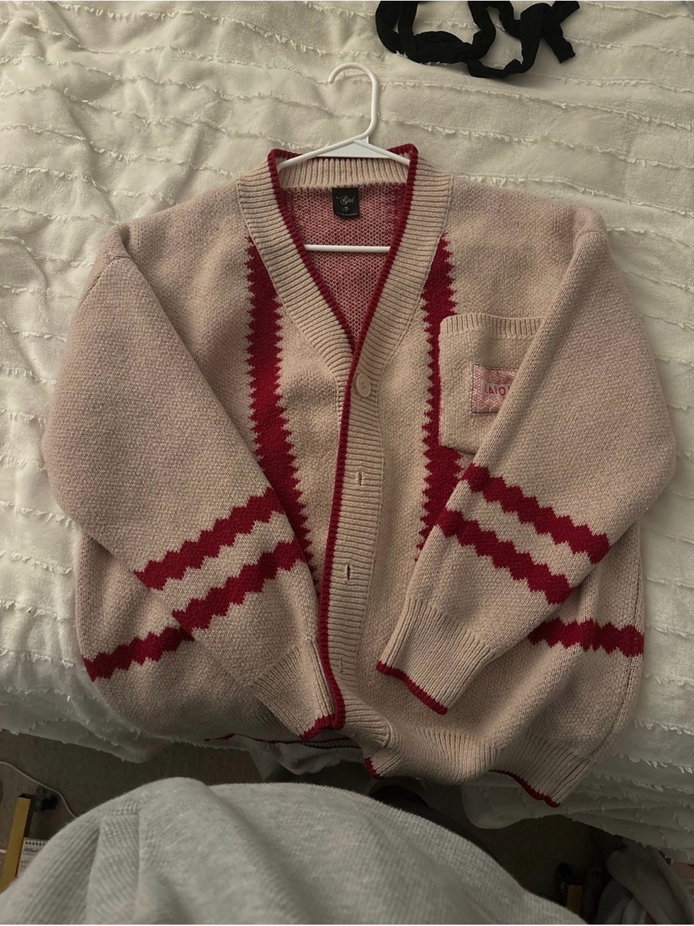 Cozy Pink Cardigan with Red Zigzag Trim